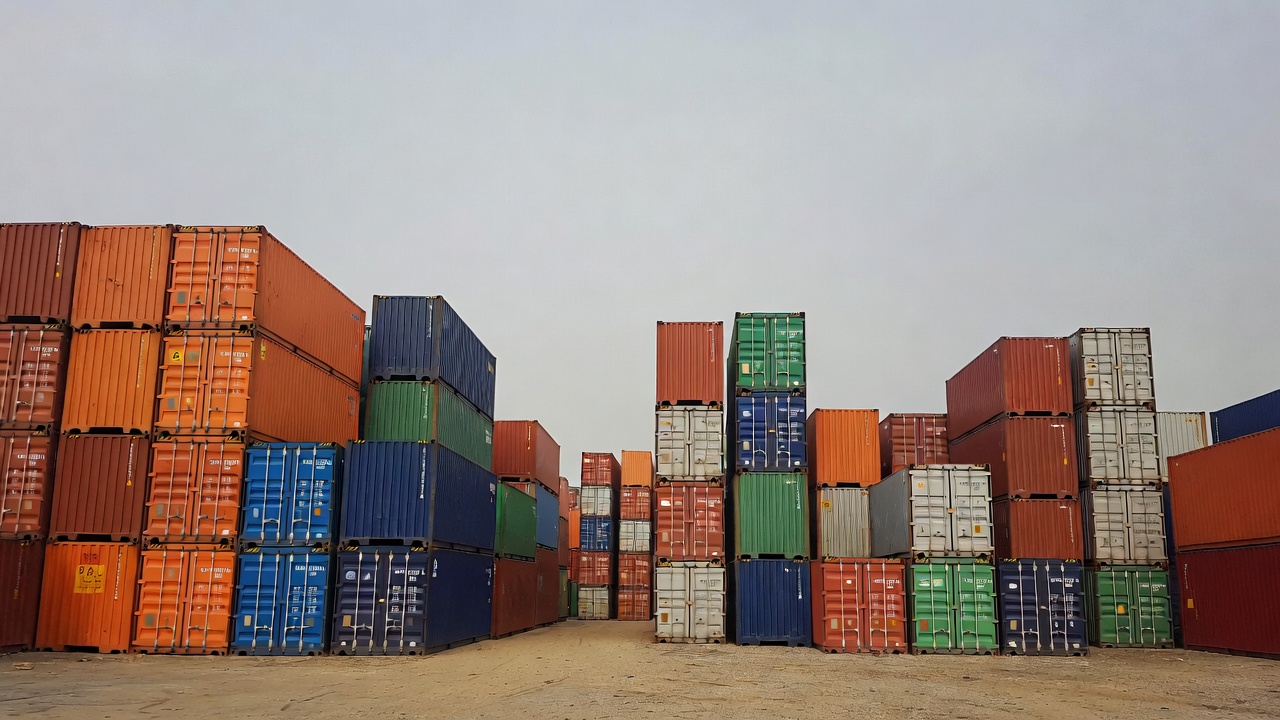Large container depot with hundreds of shipping containers stacked high